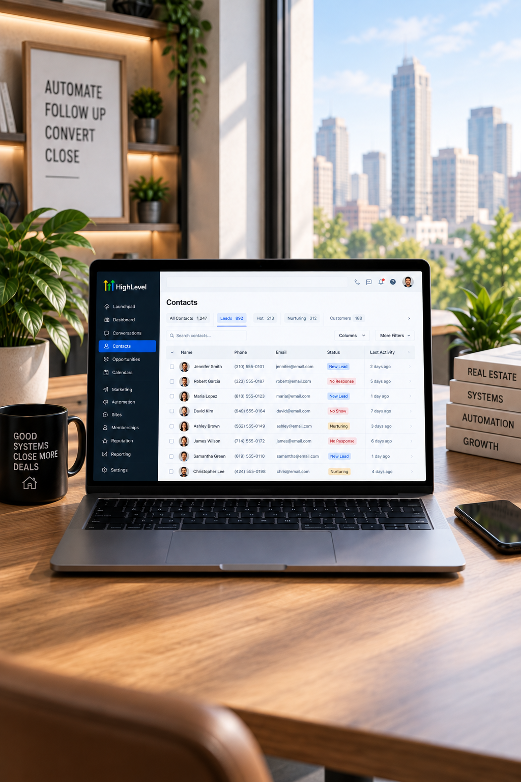 A CRM contacts dashboard on a laptop in a real estate workspace